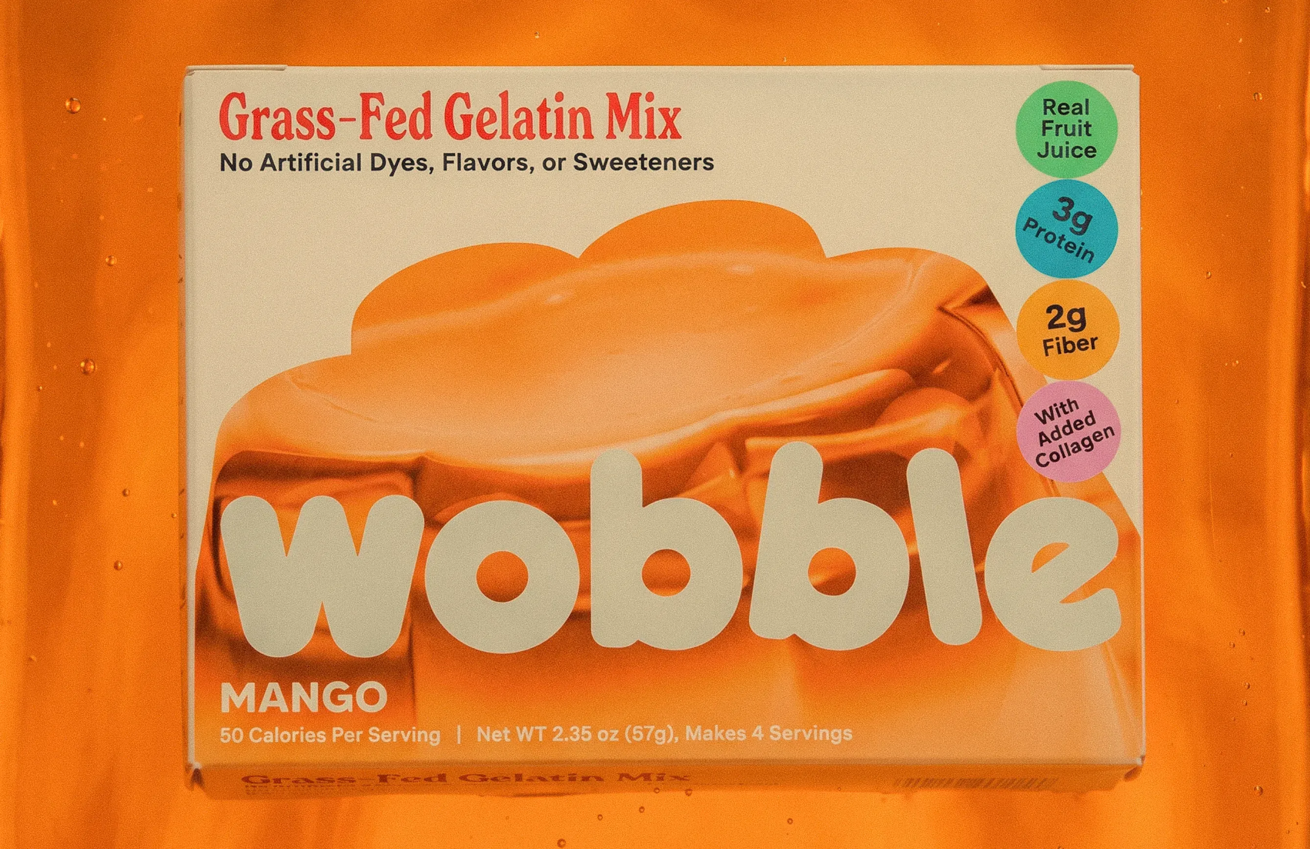 Wobble mango gelatin mix box on orange