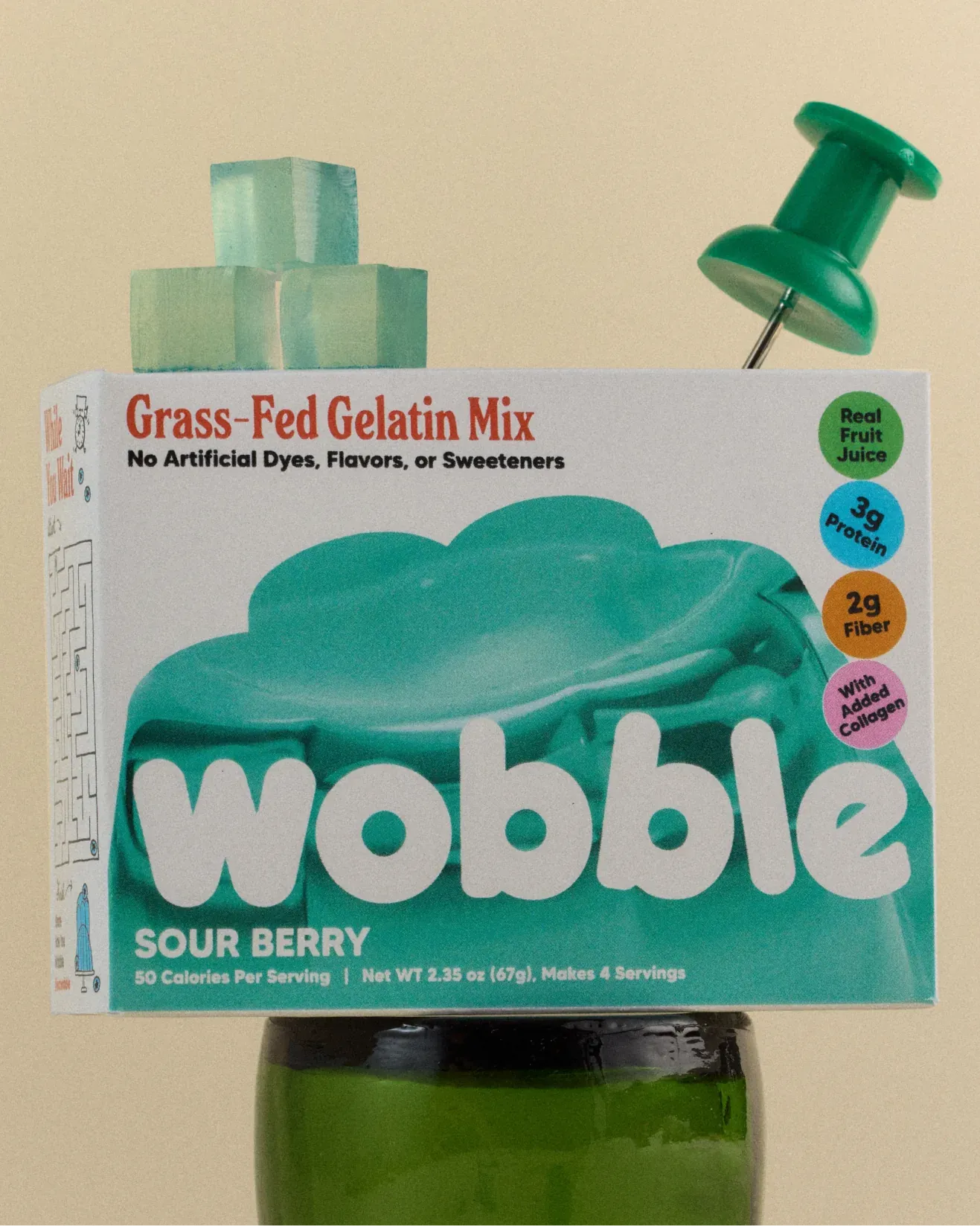 Wobble sour berry box on a glass bottle with a pushpin